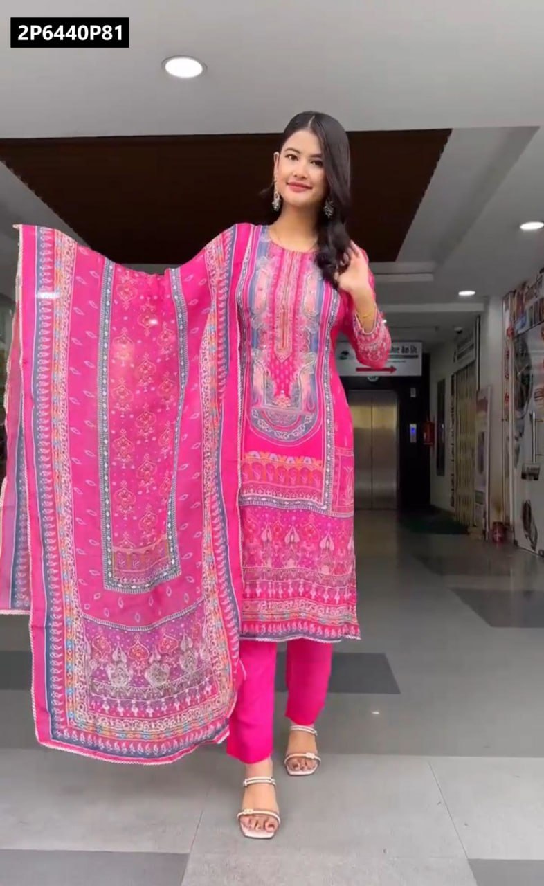 Full body shot of a model elegantly posing in a hot pink Chinon kurti set with dupatta and matching pants, highlighting the elaborate digital prints.