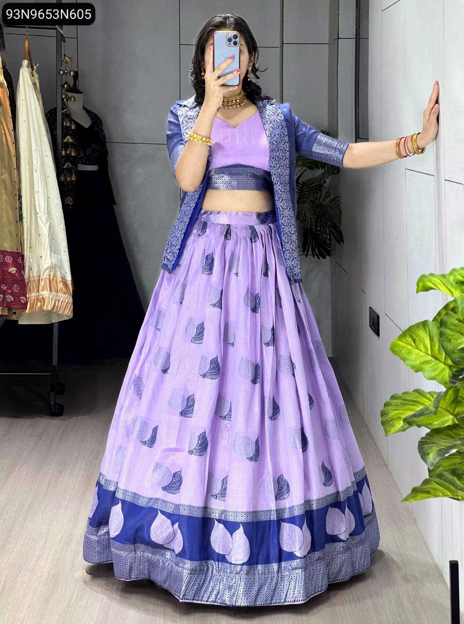 Full body view of model in TRENDBUY lavender Jacquard Silk koti jacket lehenga set with royal blue border, posing against a white wall.