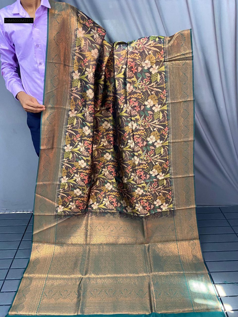 TRENDBUY Kanchi Pattu Silk Saree with vibrant digital floral print and a rich dark green contrast zari border, elegantly draped.