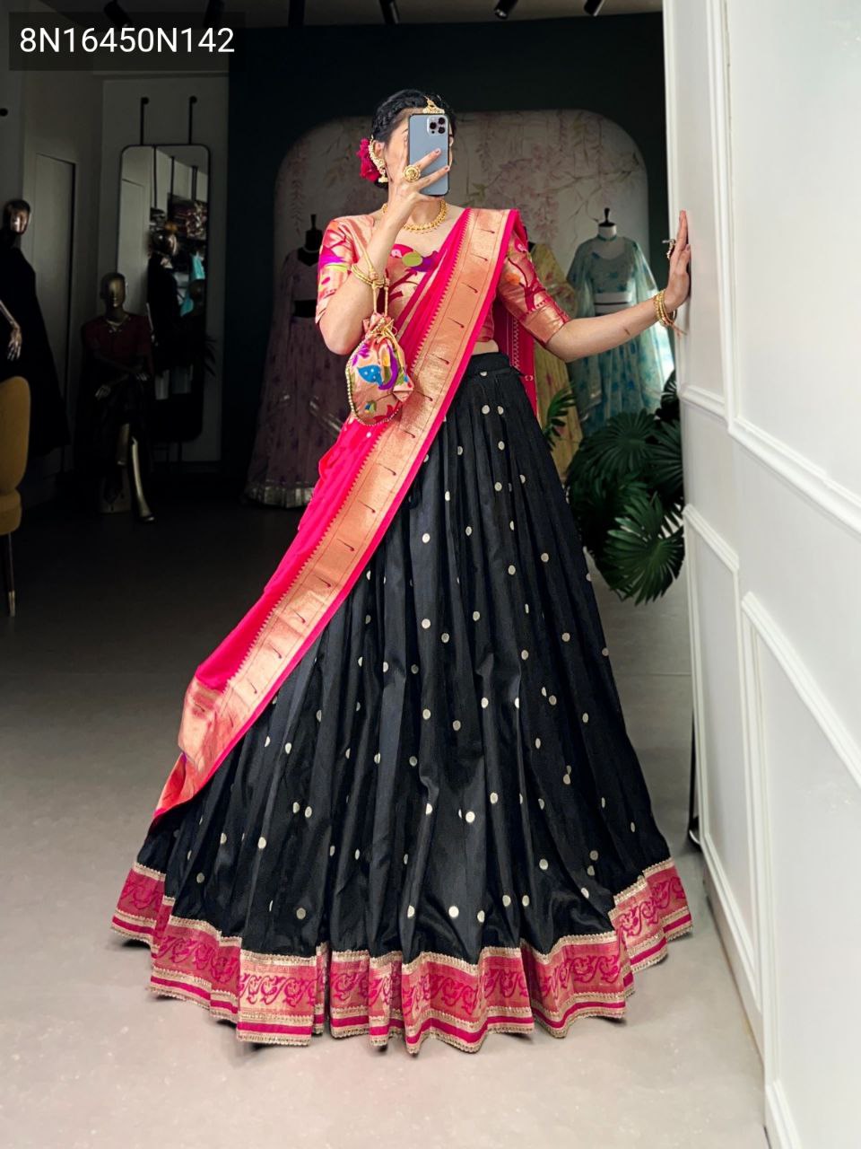 TRENDBUY KEERTHNA Paithani Jacquard Silk Lehenga Choli set with black lehenga skirt, vibrant pink dupatta, and intricate multicolor blouse, worn by a model in a full body shot.