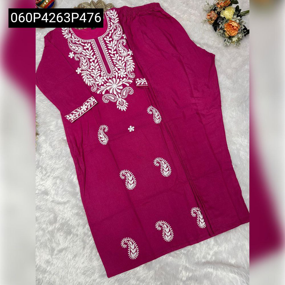 TRENDBUY Magenta Khadi Cotton Kurti and Pant Set with intricate white floral and paisley embroidery, unfolded on a white textured background with decorative elements.