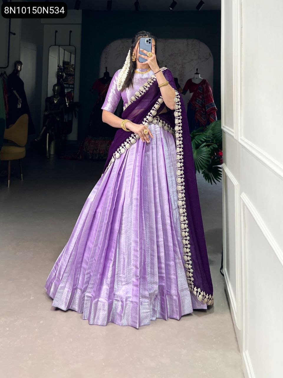 Full view of TRENDBUY Lavender Jacquard Silk Lehenga Choli, model posing gracefully, highlighting the weaving work and voluminous flair.