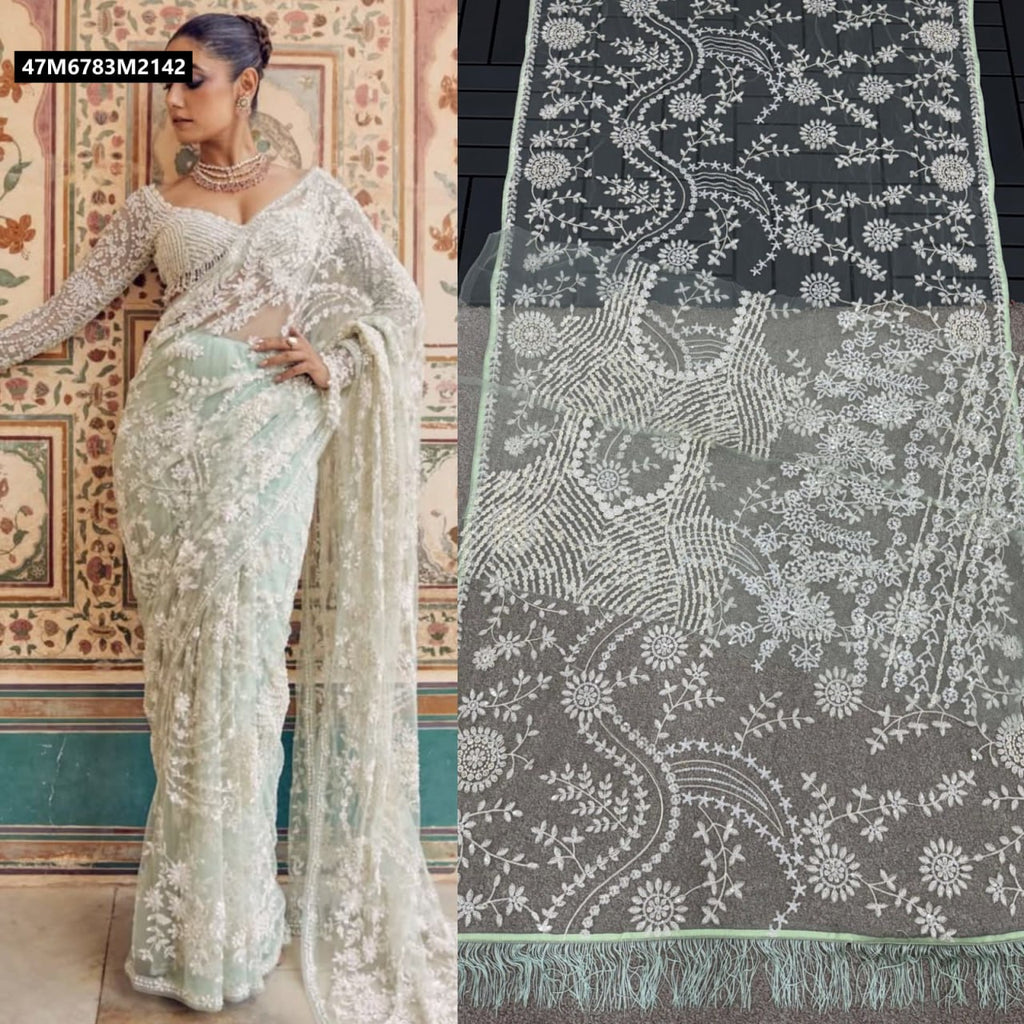 TRENDBUY Mint Green Mono Net Saree with heavy 5MM multi and sequin embroidery worn by a model, accompanied by a close-up of the embroidered fabric with delicate tassels.
