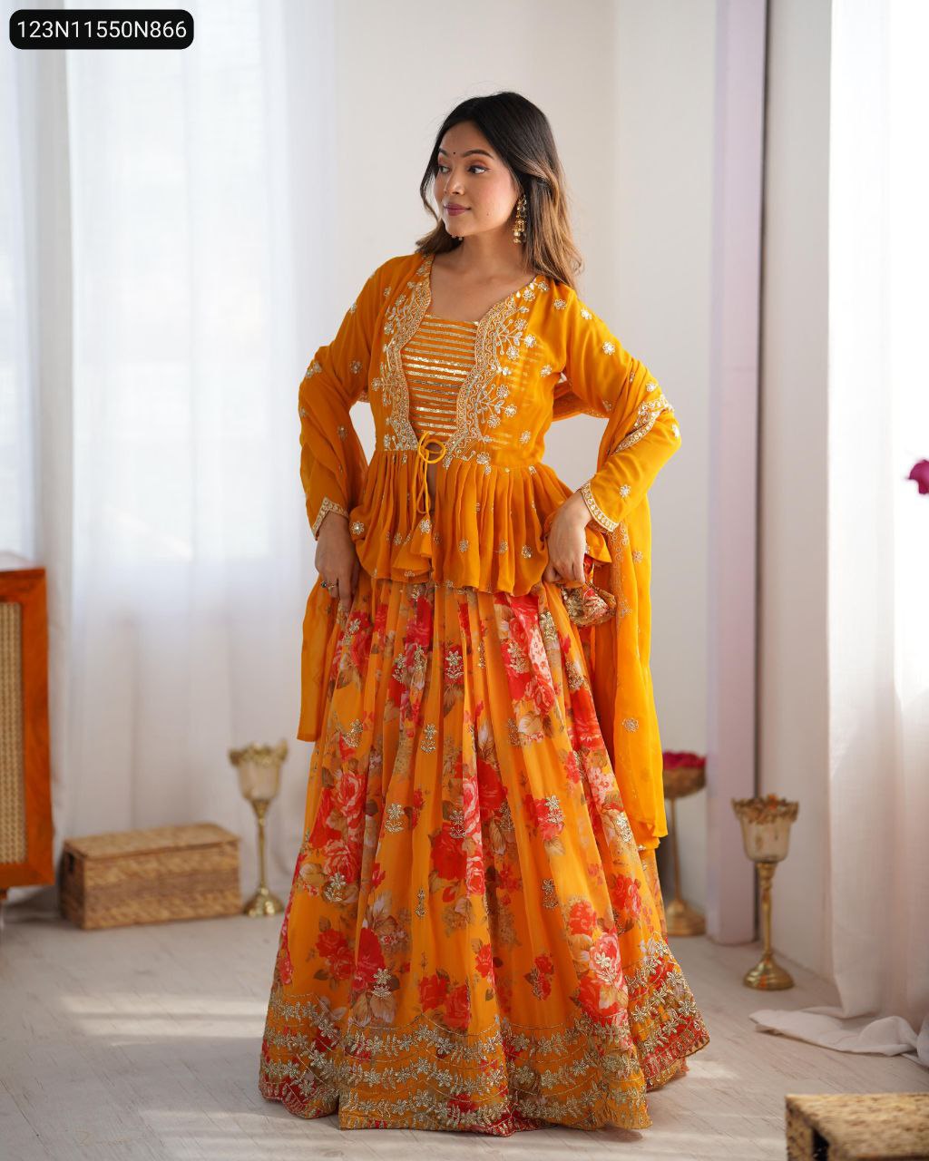 Model standing confidently, presenting the front view of the TRENDBUY Mustard Faux Georgette Lehenga Koti set with floral digital print.