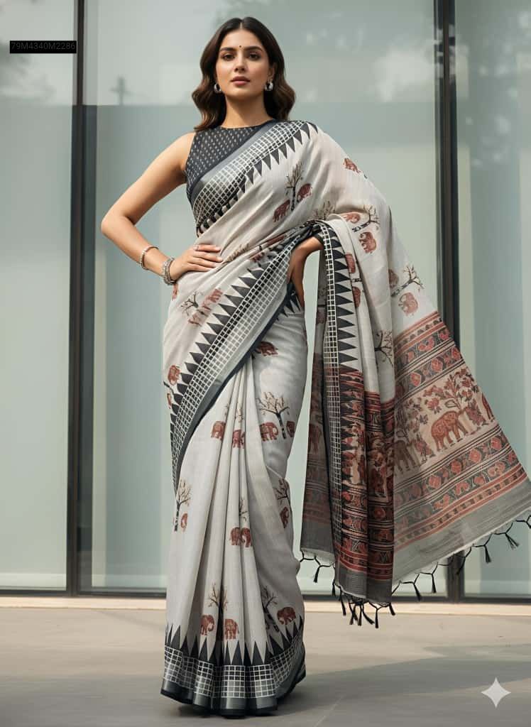 Full-length model showcasing the TRENDBUY Off-White Linen Gajraj digital print saree with black borders and a vibrant red and black patterned pallu, standing confidently outdoors against a building.