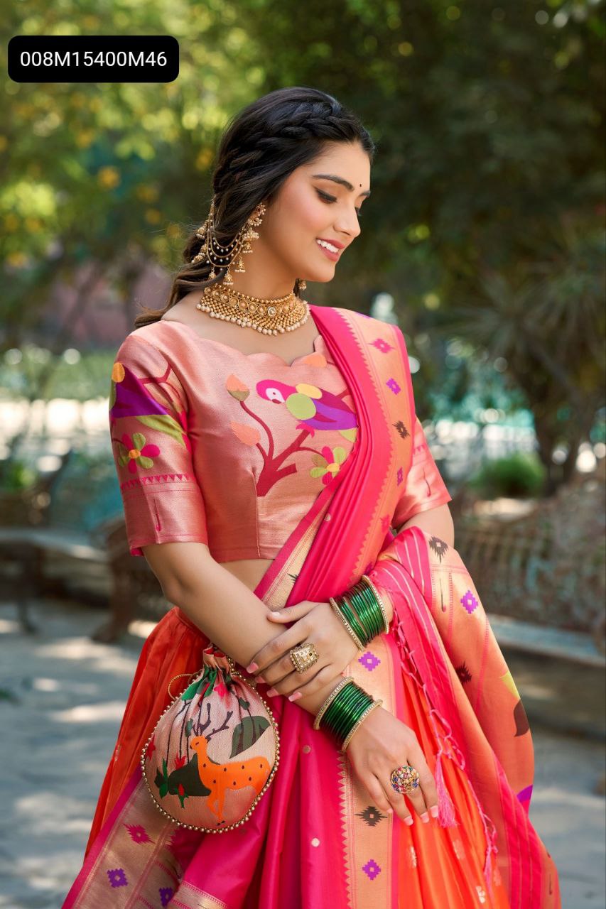 TRENDBUY model in Pink Orange Paithani Lehenga Choli, showcasing intricate Jacquard Silk blouse with bird motifs and matching Paithani batwa, adorned with traditional jewelry and green bangles.