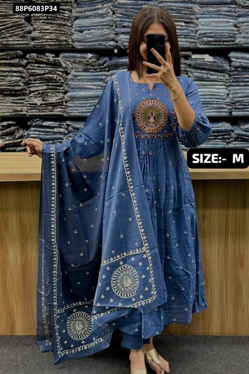 Full body shot of a model wearing an Indigo Blue cotton Anarkali kurta set featuring peacock motif yoke embroidery, with matching pants and a malmal cotton dupatta.