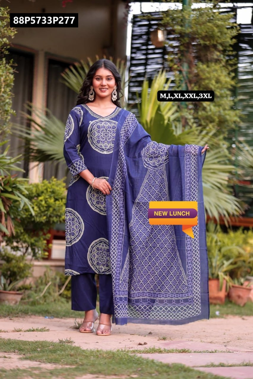 Full body shot of model wearing TRENDBUY Navy Blue Premium Cotton Kurta Set with hand work, matching pants, and dupatta, posing gracefully outdoors.
