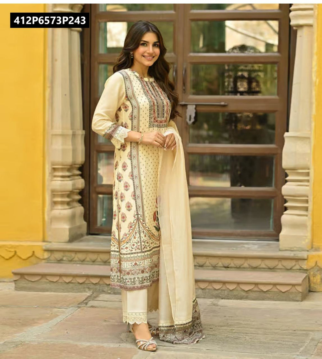 Full-body shot of a model elegantly posing in the TRENDBUY Off-White Muslin Kurti Set, showcasing the intricate hand jari, patti, and mirror work with lace details, against a yellow architectural background.