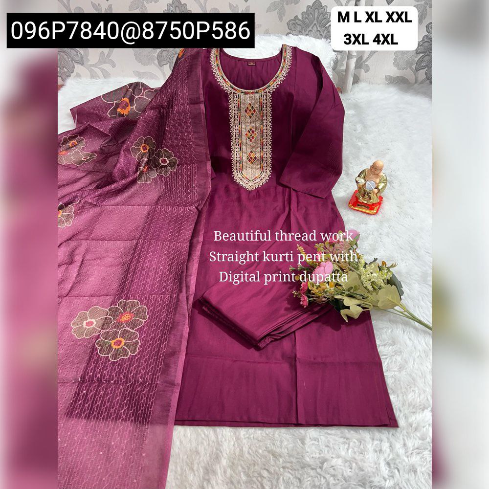 Full body model shot of a woman wearing the TRENDBUY maroon kurti pant set, showcasing the straight kurti with multi-color hand embroidery, matching pants, and the heavy chanderi digital print dupatta with latkan and sequin work.