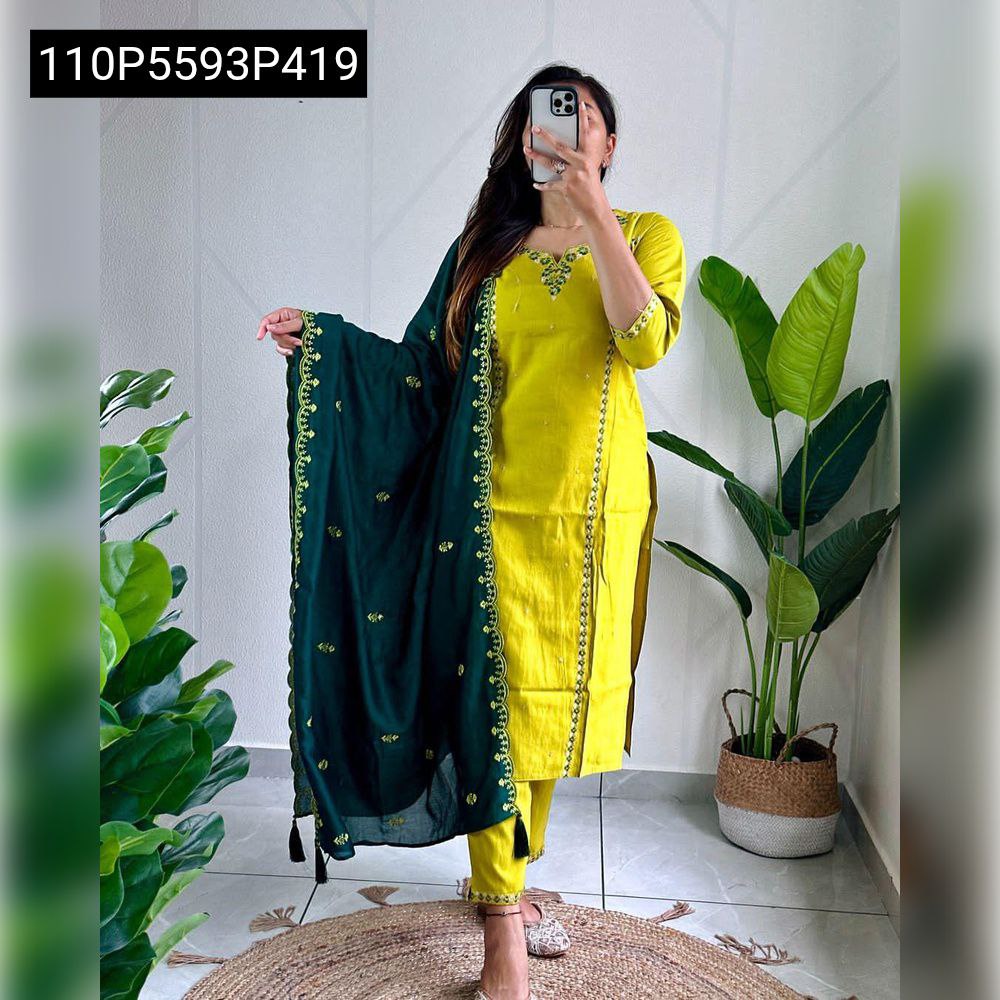 Model captured in a mirror selfie, showcasing the vibrant parrot green kurta with detailed handwork, matching fitted pants, and the expansive dark green sequence-embroidered dupatta.