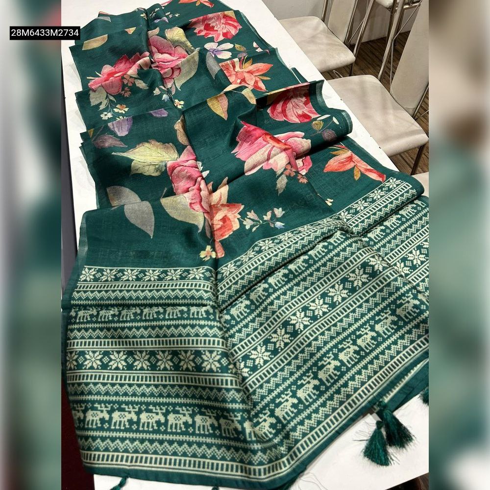 Full view of folded green TRENDBUY semi desi tussar saree with digital floral print and Kalamkari pallu.