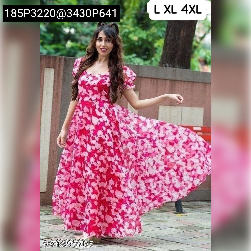 Full body shot of a woman wearing a pink and white abstract print georgette maxi dress with puff sleeves, flowing skirt.