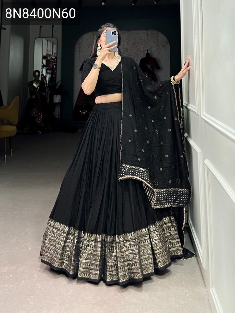 TRENDBUY Black Pure Chanderi Lehenga Choli with gold zari border, featuring a full-body model shot with an embroidered blouse and sequin dupatta.