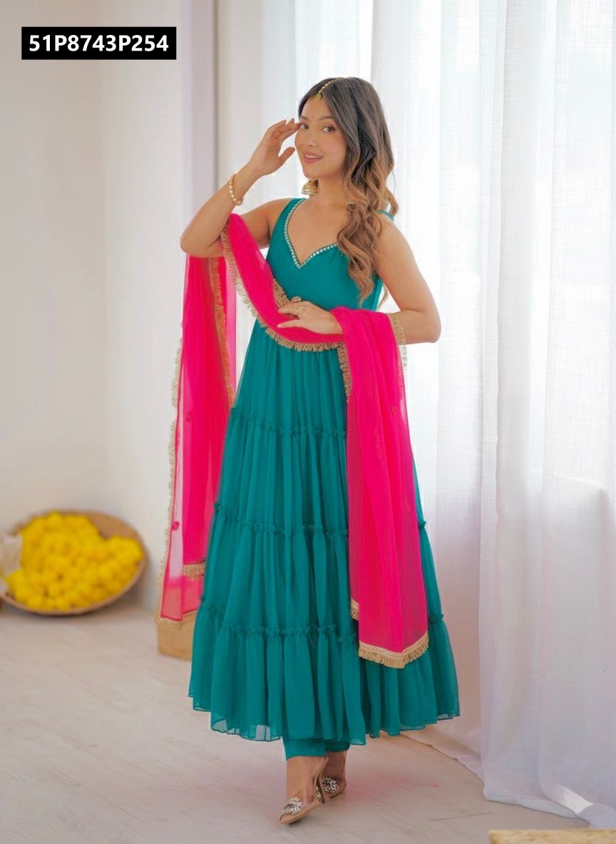 Elegant full-body shot of a model in a teal sleeveless tiered gown with a beautiful hot pink dupatta, perfect for festive wear.