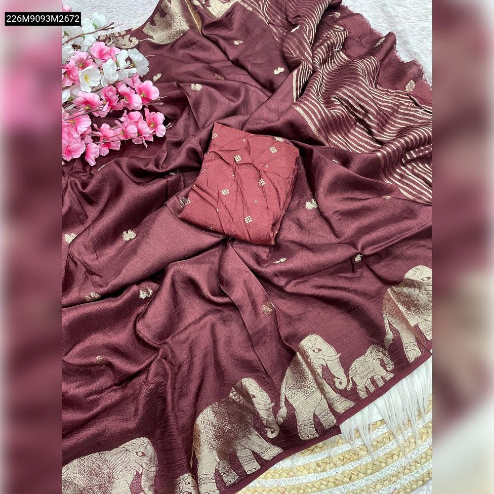 Detailed view of TRENDBUY Maroon Khadi Silk Saree draped to show gold zari elephant border and striped pallu with folded butti blouse.