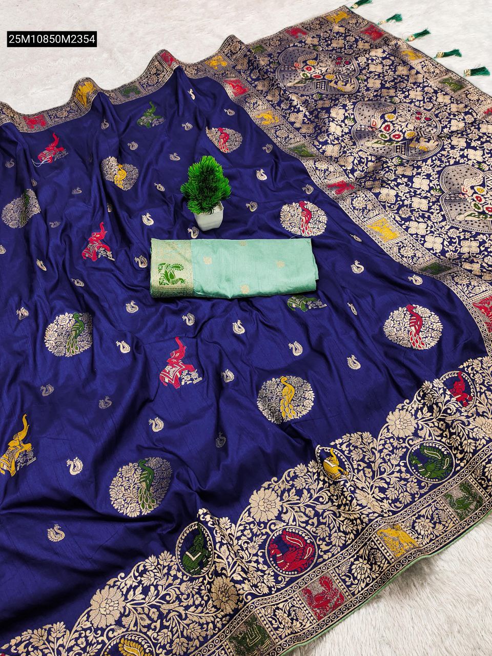 TRENDBUY Royal Blue Pure Viscose Dolla Silk Saree with multi-color Meenakari elephant and peacock motifs, featuring a light green contrast blouse piece, displayed on a white surface.