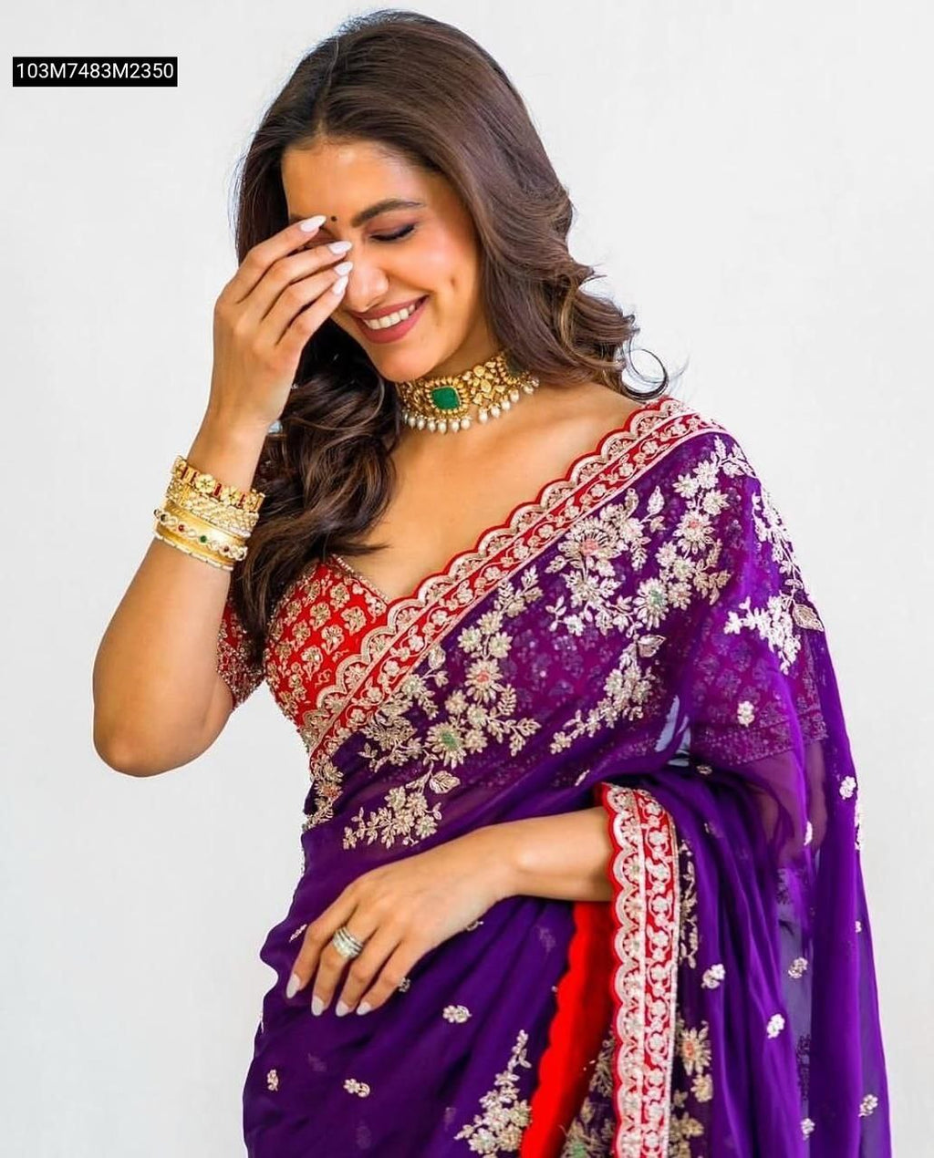 Model in TRENDBUY purple rangoli silk saree with red embroidered blouse and traditional jewelry, laughing.