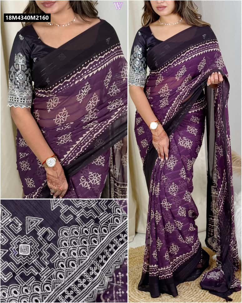 Model wearing a draped TRENDBUY Purple shaded georgette saree with white motif print and matching embroidered blouse, showcasing the full ensemble and blouse detail.