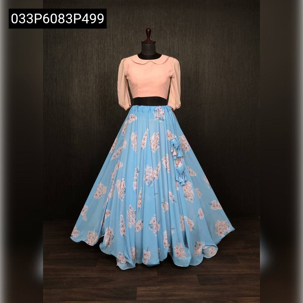 TRENDBUY ready-to-wear light blue faux georgette lehenga with pink floral print and peach puff-sleeve blouse on a mannequin, full view