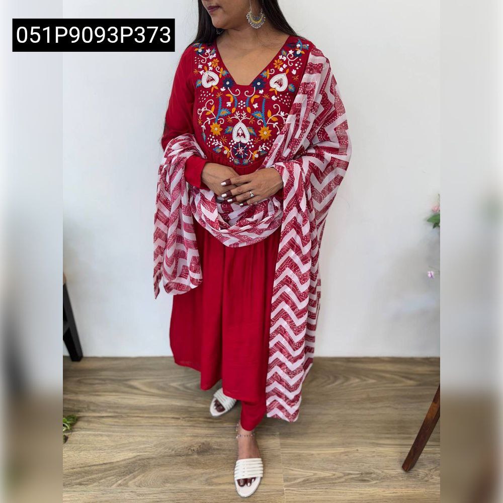 Full body shot of a model standing, wearing the TRENDBUY red embroidered kurti set with a white and red chevron patterned dupatta.