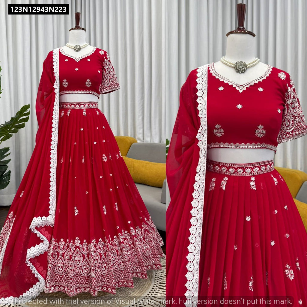 Full view of TRENDBUY Red Faux Georgette Lehenga Choli set displayed on a mannequin, featuring all-over sequin work and a matching dupatta with lace border, elegant ethnic wear