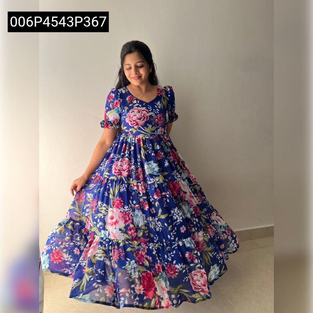 Full body shot of a model joyfully twirling in the TRENDBUY Royal Bloom blue floral tiered maxi dress, highlighting its flow and comfortable fit.
