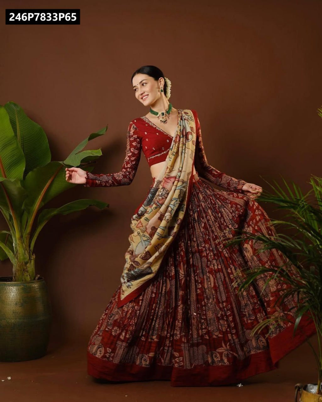 TRENDBUY Women's Rust Red Tussar Silk Kalamkari Lehenga Choli with full-sleeve blouse and printed dupatta, modeled elegantly.