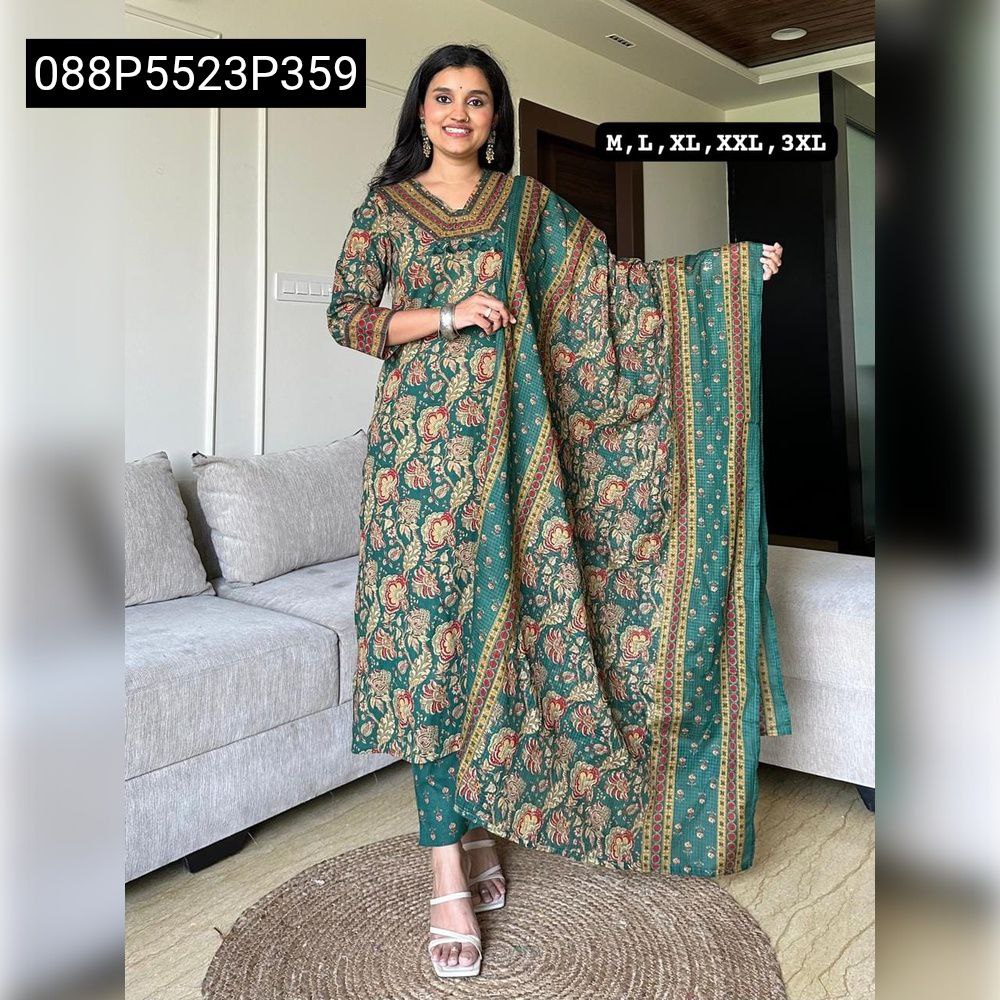 TRENDBUY Deep Green Saganeri Block Print Cotton Kurta Set with embroidered V-neck and matching dupatta, modeled by a woman smiling in a modern living room setting.