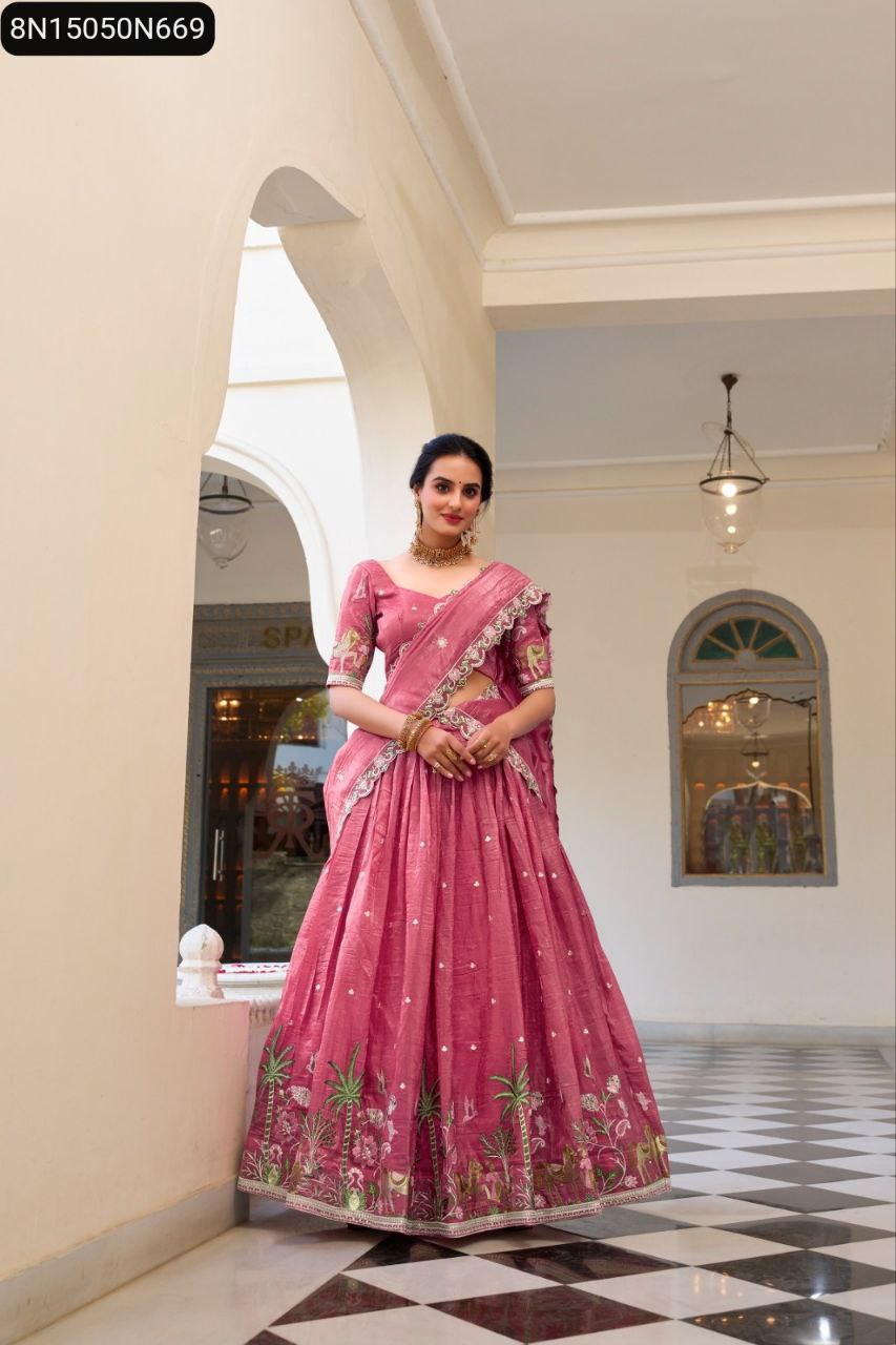 Full-body frontal shot of a model gracefully standing in a pink TRENDBUY Gold Crush Lehenga Choli, showcasing its elaborate embroidery and elegantly draped dupatta.