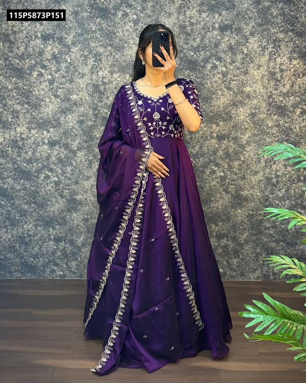 Full body view of a model showcasing the TRENDBUY purple embroidered silk gown with dupatta draped elegantly