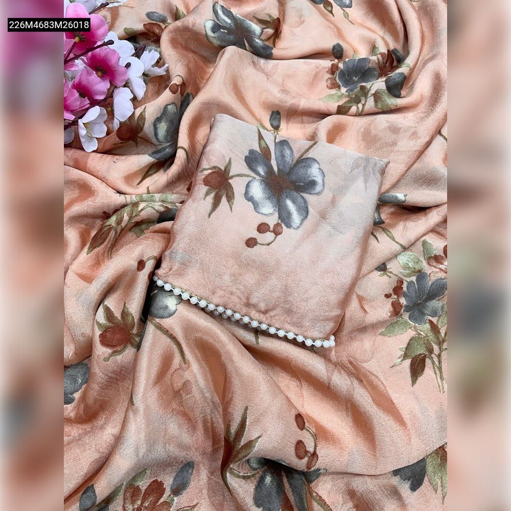 Draped peach Chinnon saree with grey-blue and maroon floral print, visible moti lace border, and matching folded blouse.