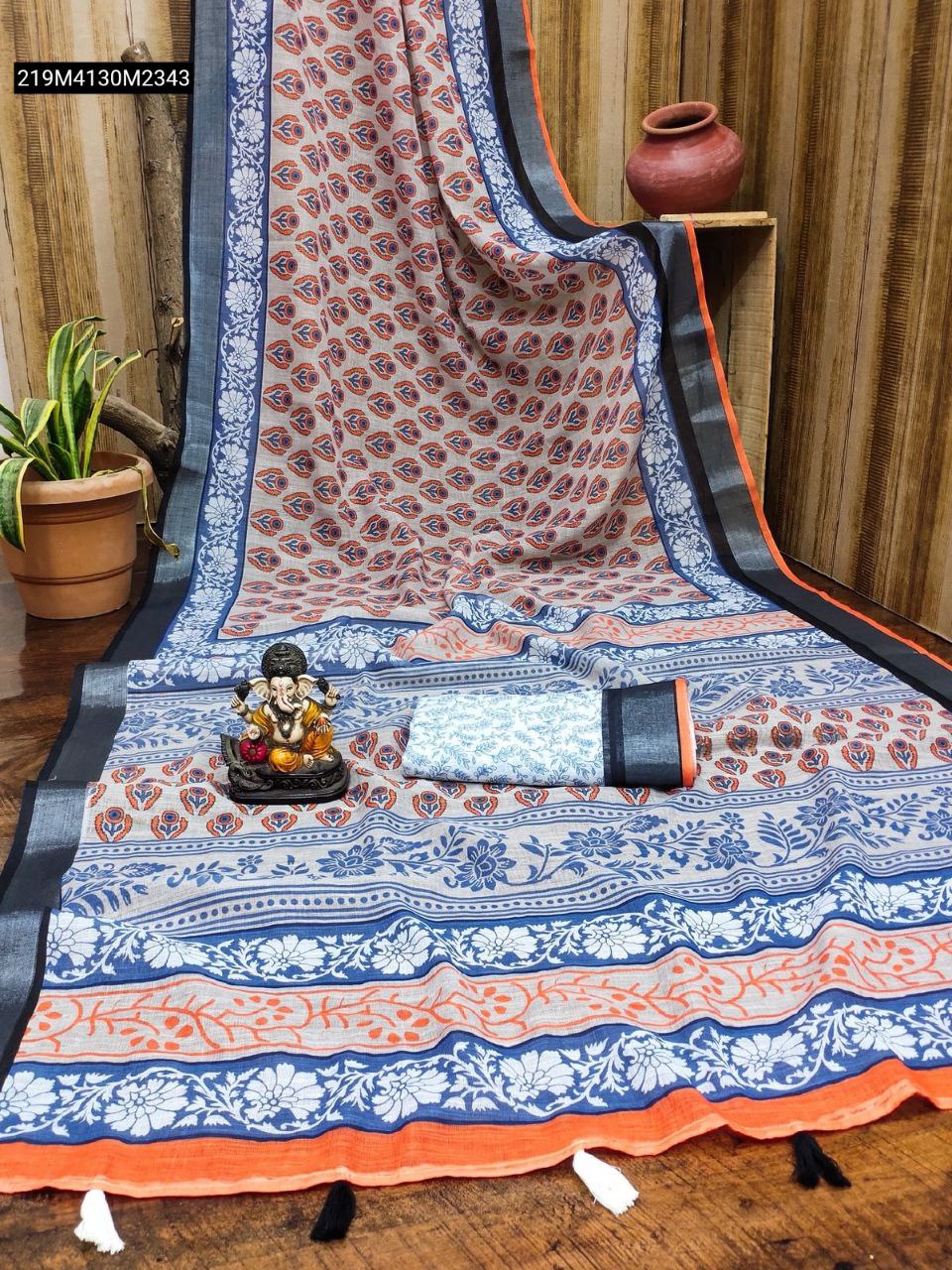 TRENDBUY Soft Linen Cotton saree in beige and blue with intricate batik digital print, woven silver border, and tassels.
