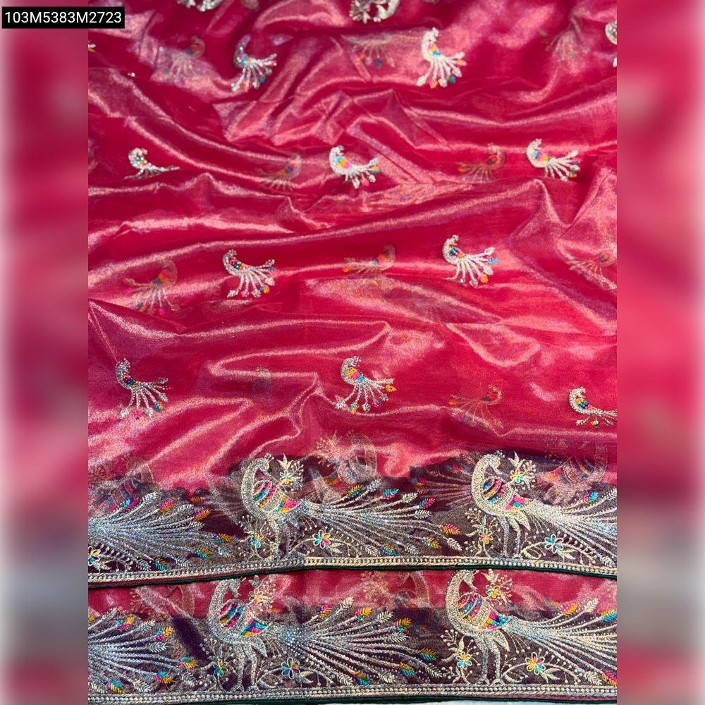TRENDBUY Red Tissu Organza Silk Saree close-up, showcasing heavy zari peacock embroidery with colorful accents.