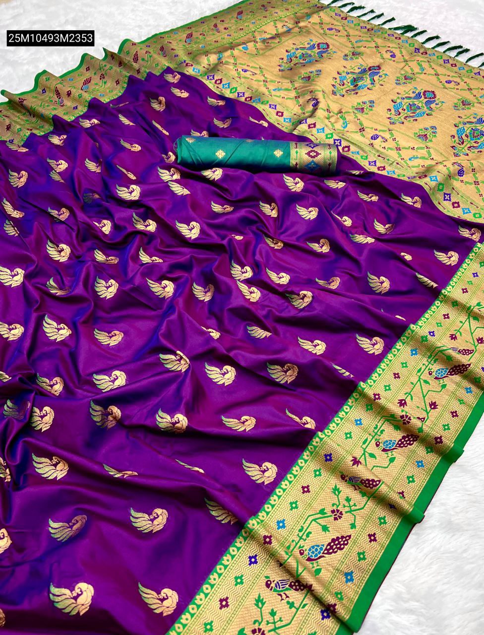 Royal Purple Pethani silk saree with golden zari Meenakari peacock motifs, intricate green border, and golden pallu.