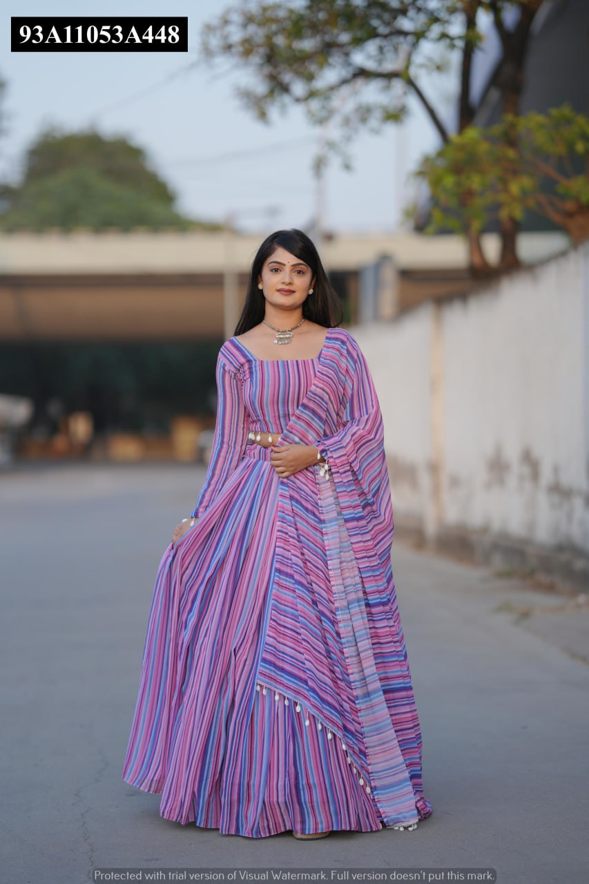 Full body view of model gracefully posing in TRENDBUY striped faux georgette lehenga choli set.