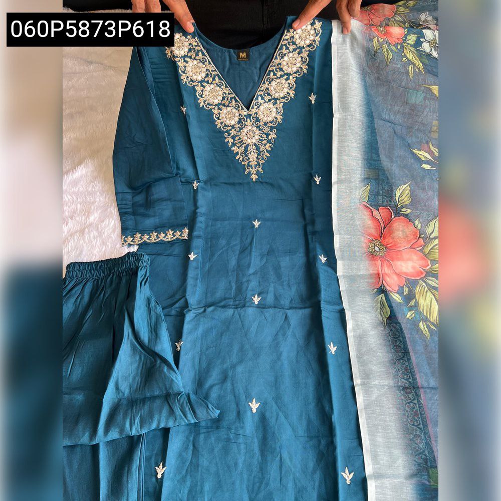 Full view of TRENDBUY Teal Blue Roman Silk kurti set featuring intricate gold embroidery on V-neck, matching pant, and a Chanderi silk dupatta with vibrant floral digital print and tassels, held up for display.