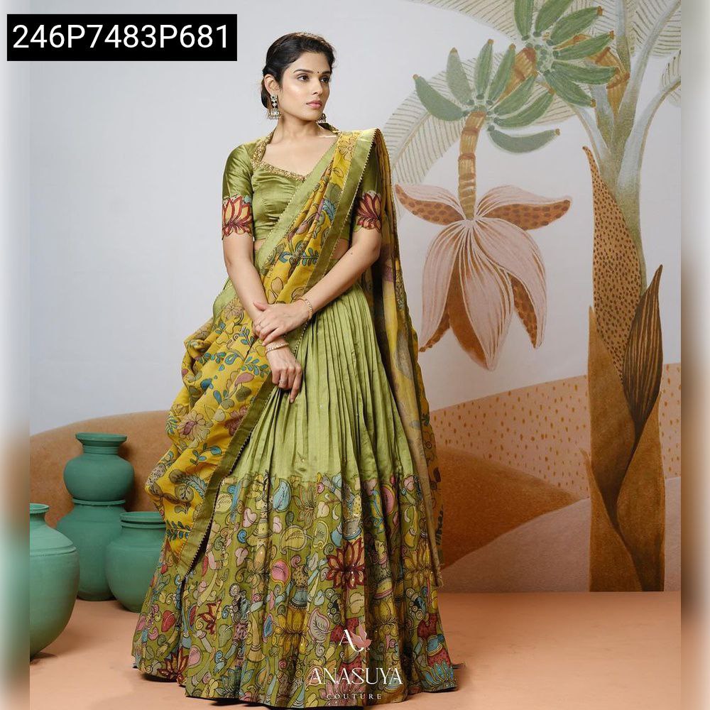 TRENDBUY Olive Green Tussar Silk Lehenga Choli with Kalamkari Print Dupatta, full body view on model.