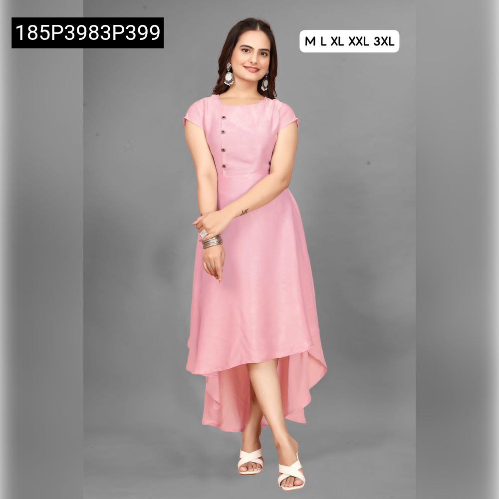 Model smiling, wearing a pink TRENDBUY velvet high-low dress with short sleeves and a rounded neckline.