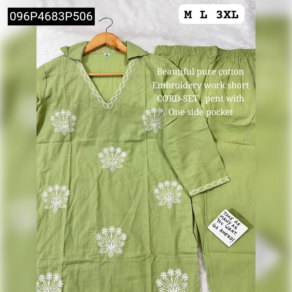 TRENDBUY sage green cotton kurti and pant set on a wooden hanger, adorned with elegant white floral embroidery.