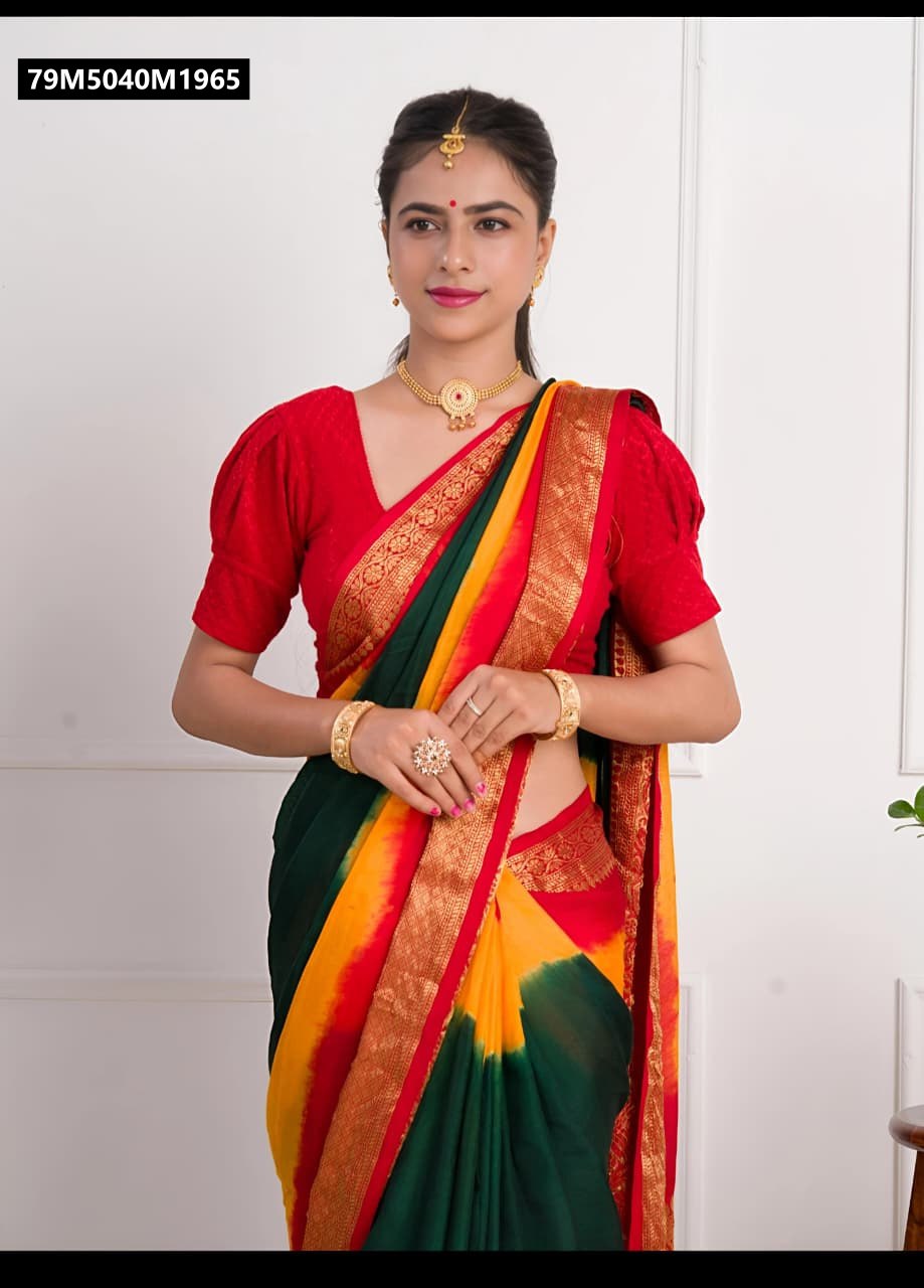 Full view of model in vibrant green, yellow, red tie-dye Mangalagiri silk saree.