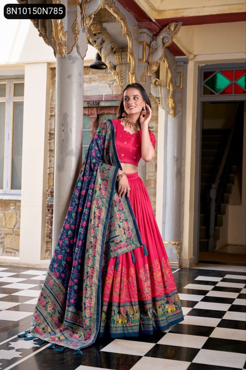 TRENDBUY Vibrant Pink Tasar Silk Lehenga Choli with blue printed dupatta, model posing elegantly in a traditional setting.