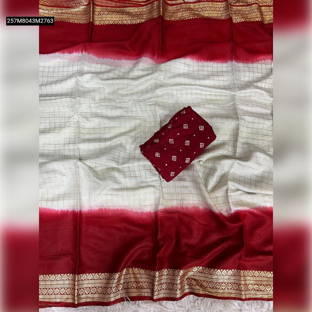 TRENDBUY Red and White Viscose Georgette saree with 2D color chex pattern and red Viscose Butti blouse, spread out on a white fluffy surface.