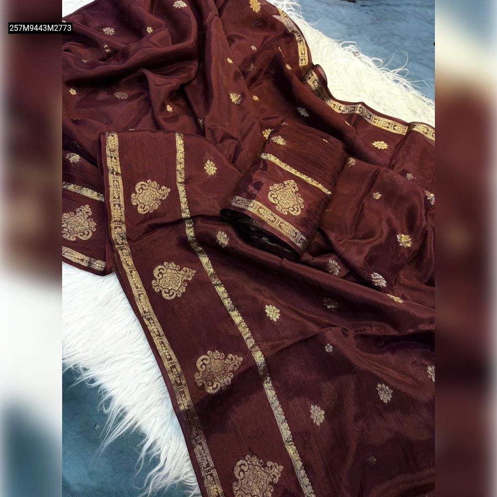 Maroon Viscose Soft Silk saree with intricate gold floral border and scattered butti designs, folded on white fur.
