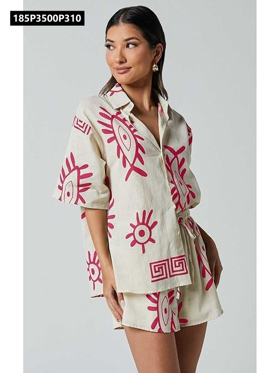 TRENDBUY model smiling, front view, wearing an off-white poly cotton co-ord set with pink abstract print shirt and matching shorts, against a light background.