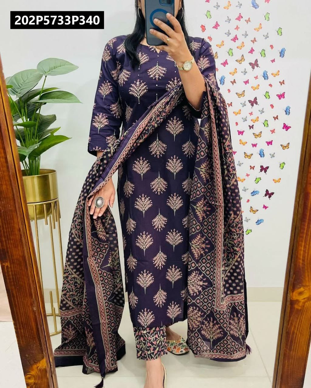 Model in Deep Purple Cotton 60-60 Kurta Set by TRENDBUY, full body mirror view, highlighting the comfortable fit and flow of the fabric.