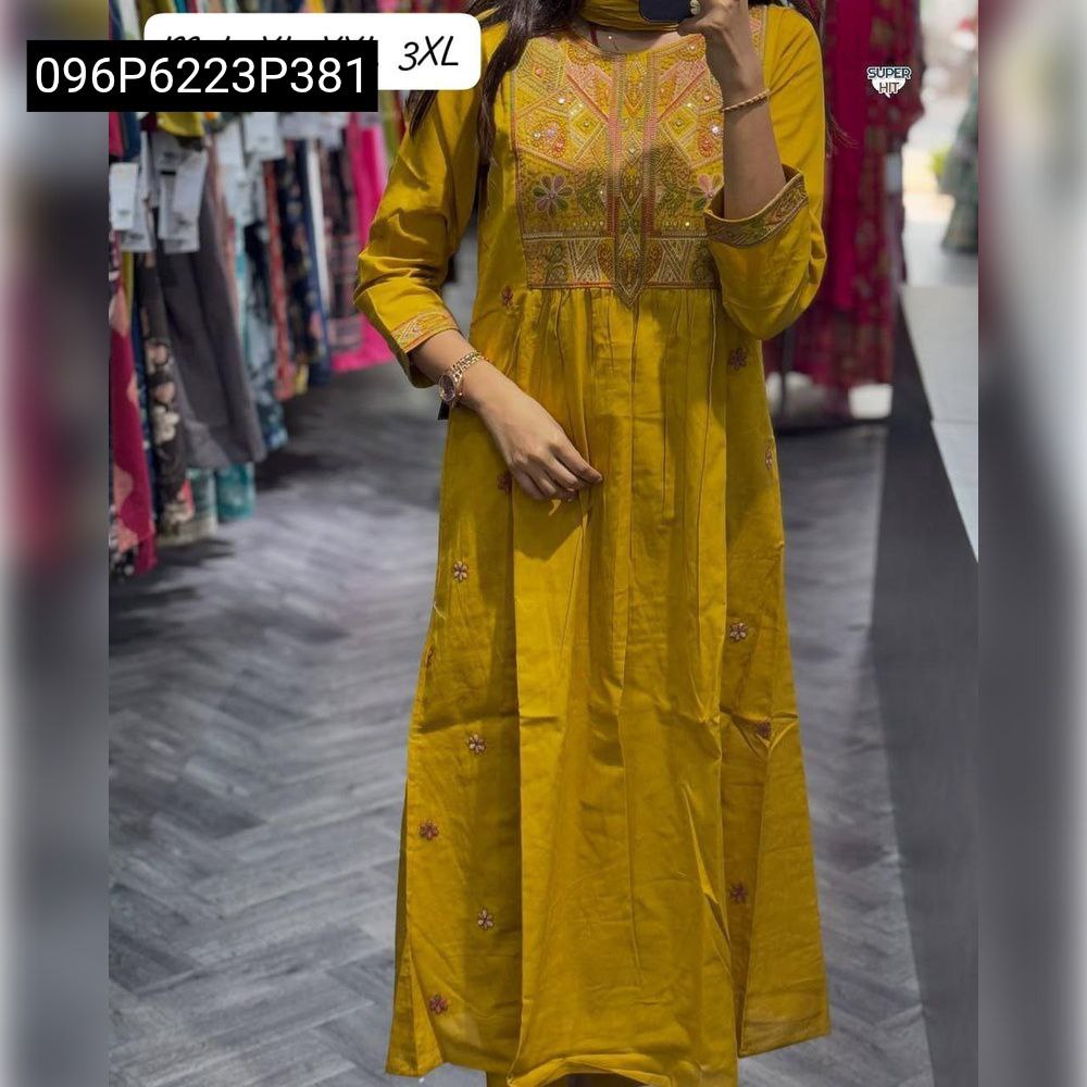 Full body shot of model wearing elegant yellow TRENDBUY Anarkali kurta set, with detailed embroidered yoke and matching dupatta.
