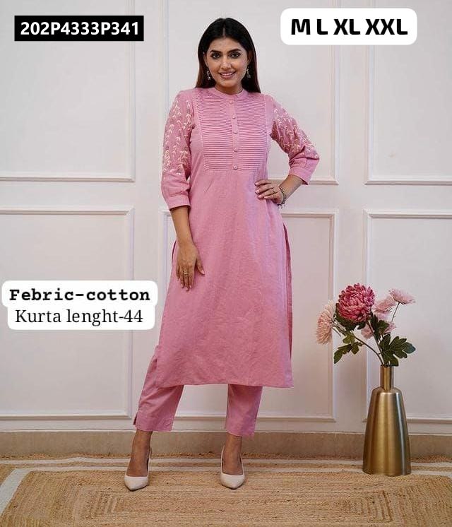 TRENDBUY Light Pink Pure Cotton Kurta and Pant Set, a bright model shot highlighting the embroidered sleeves and pintuck work, with floral decor.