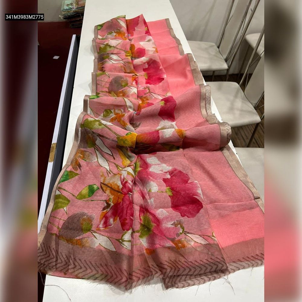TRENDBUY pink handloom linen saree displayed, featuring a full spread of vibrant multi-color floral digital prints.