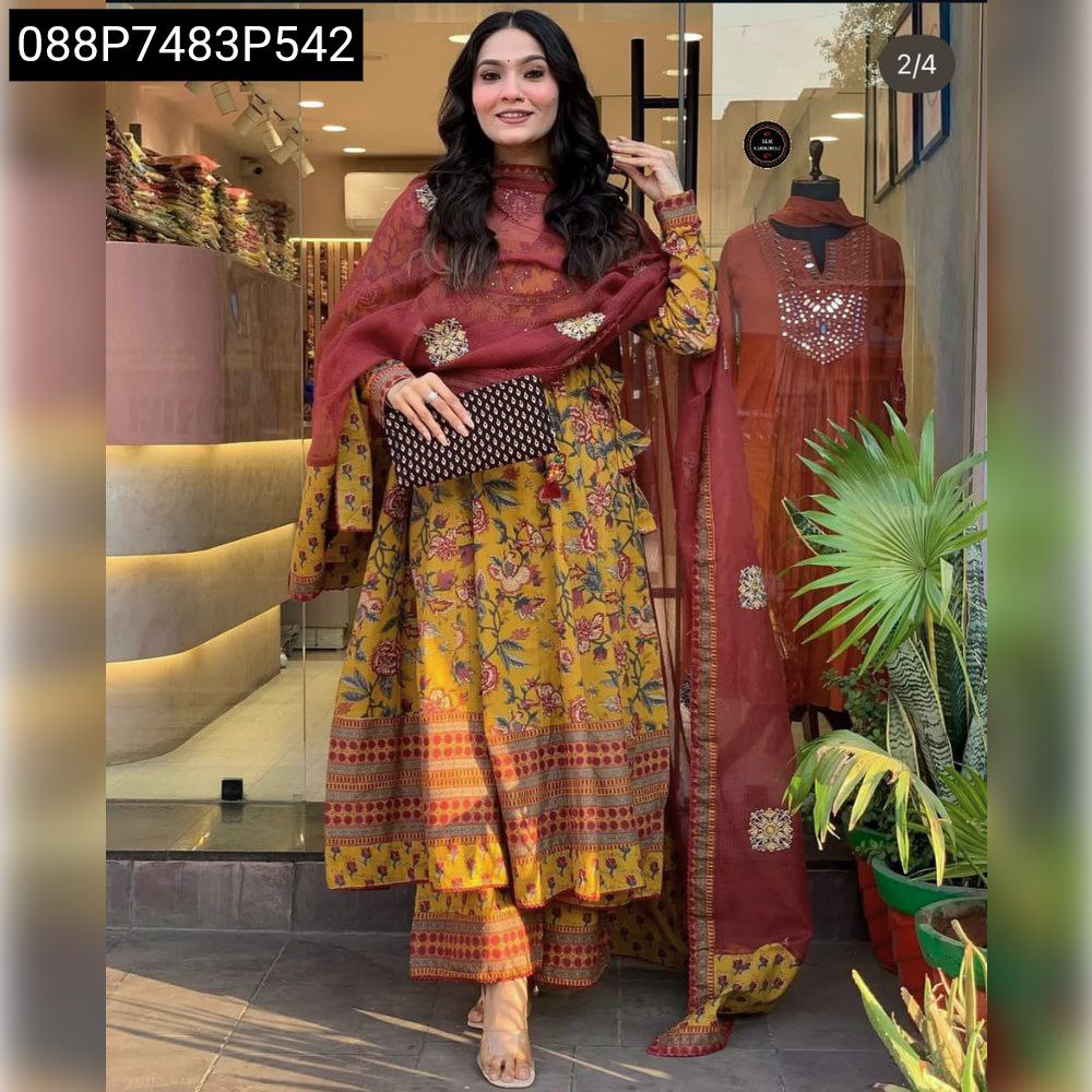 Full body shot of model wearing TRENDBUY yellow floral embroidered kurti set with pant and printed dupatta, holding a clutch, elegant pose